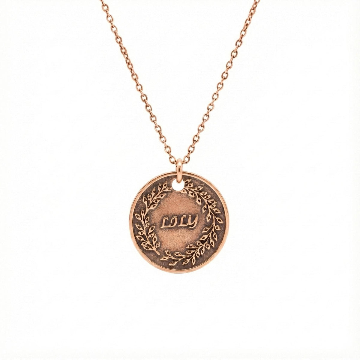 Custom Name Necklace Pendant | Hand-Stamped Sterling Silver Laurel Wreath Charm | Personal Victory Medallion, close-up detail