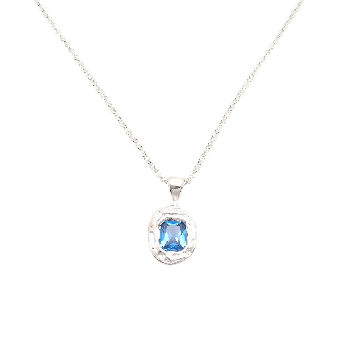 Ocean Wave Medallion | Deep Blue CZ Talisman, styled view