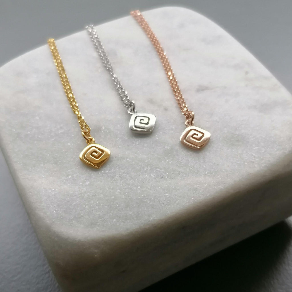 Spiral Necklace | Minimalist Small Sacred Geometry Pendant Sterling Silver | Cosmic Evolution Charm, styled view