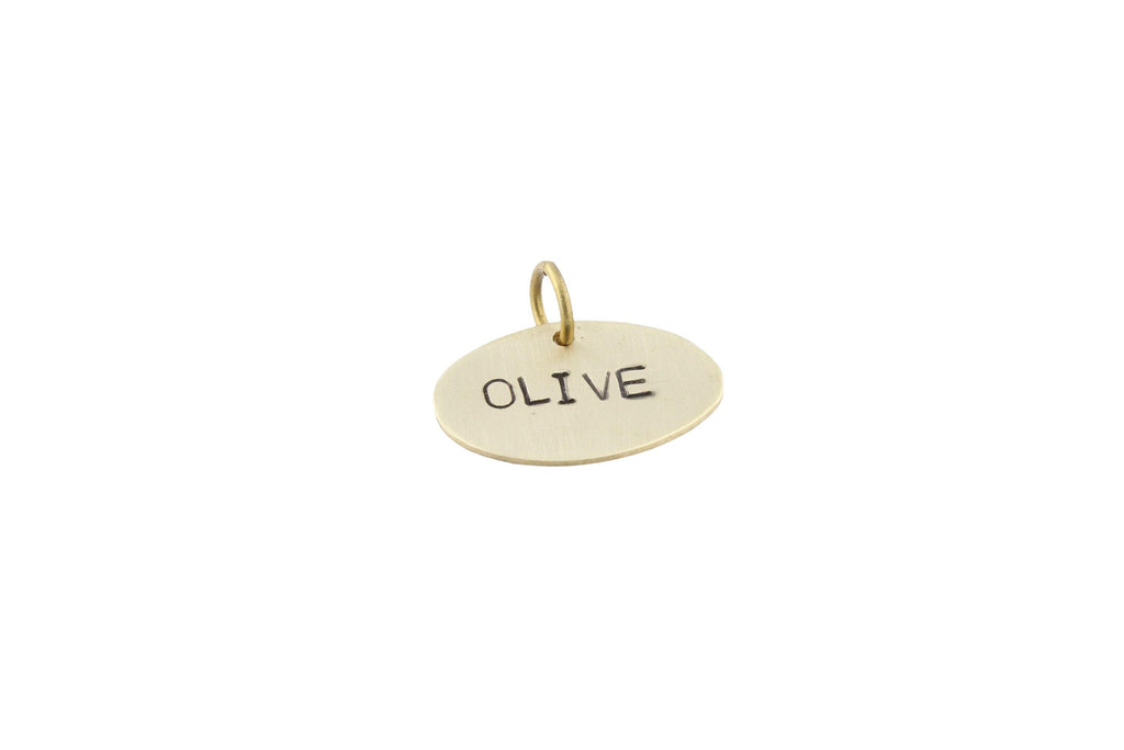 The Minimalist Oval Token | Artisan Pet ID & Custom Dog Tag, close-up detail