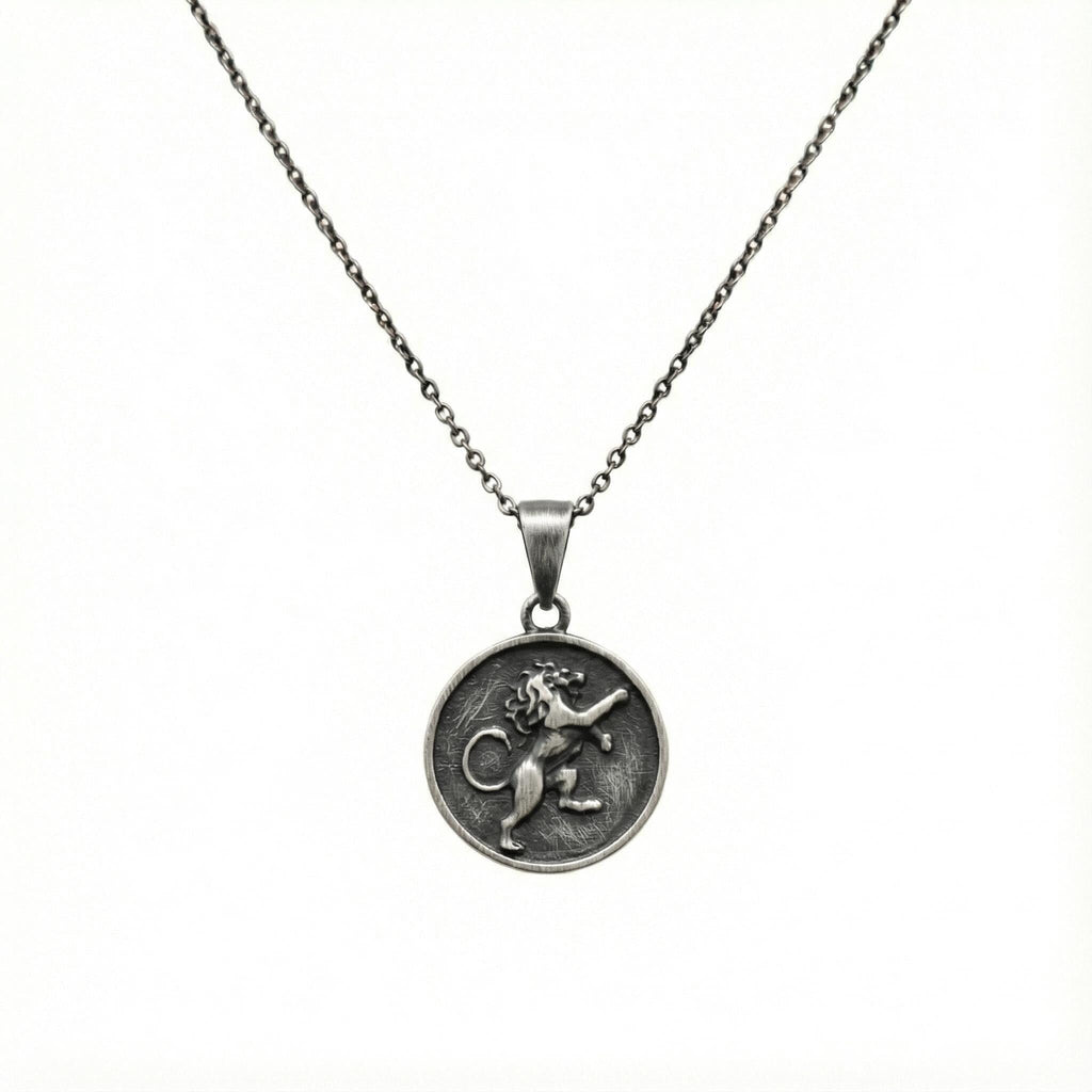 Rampant Lion Medallion necklace flat lay, oxidized sterling silver