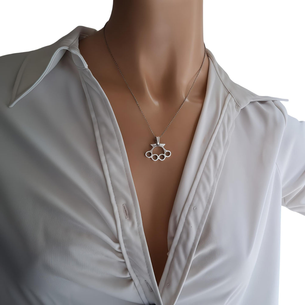 Knuckle Duster Necklace | Gold Plated Resilience Pendant, close-up detail