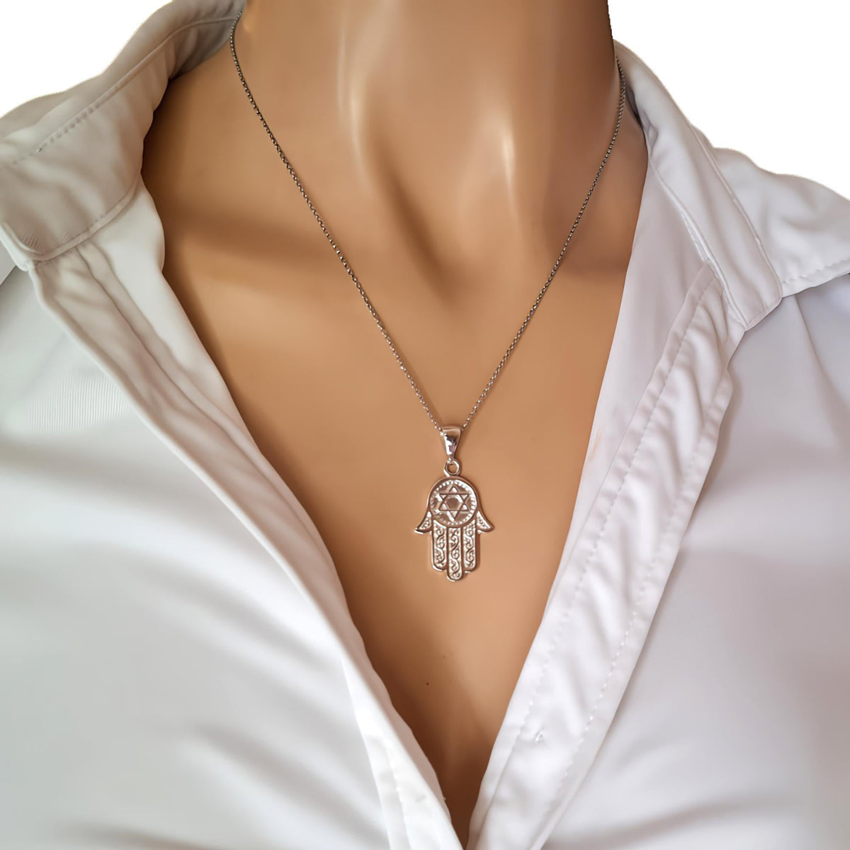 Hamsa Hand Star of David Necklace | Sterling Silver Jewish Protection Talisman | Sacred Magen David Pendant, styled view