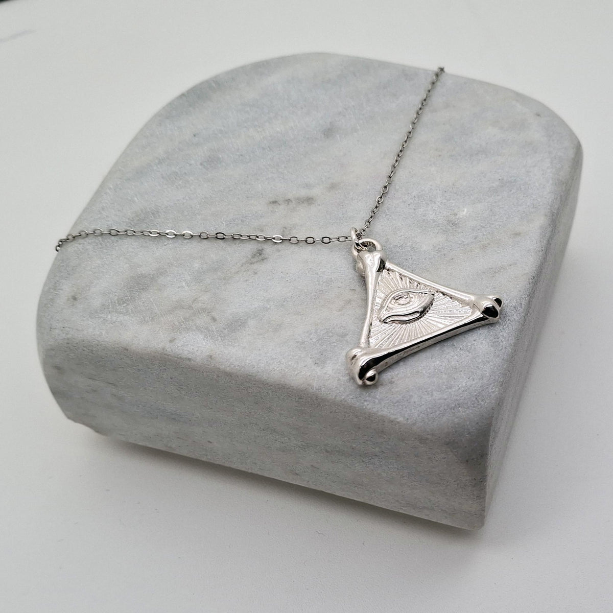 All-Seeing Eye Pendant Necklace | Sterling Silver Bone Pyramid Talisman | Esoteric Eye of Providence, close-up detail
