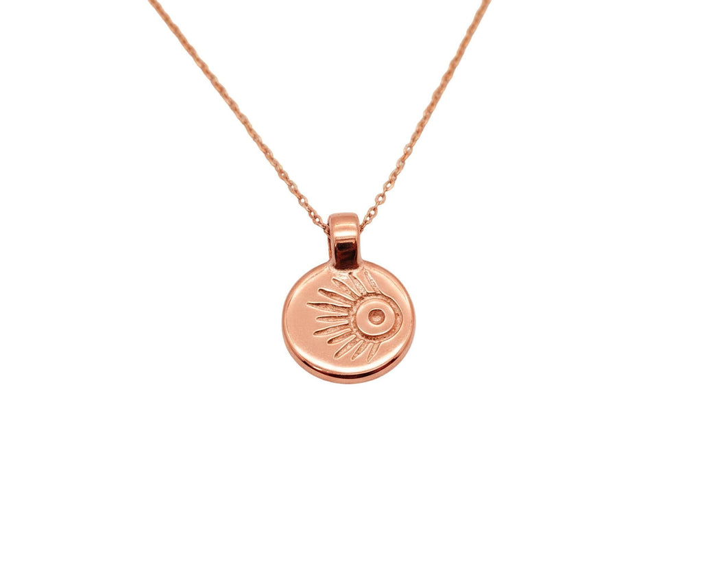 Meteor Wish Talisman Necklace | Gold Plated Celestial Coin Pendant | Shooting Star Sunburst Medallion, close-up detail