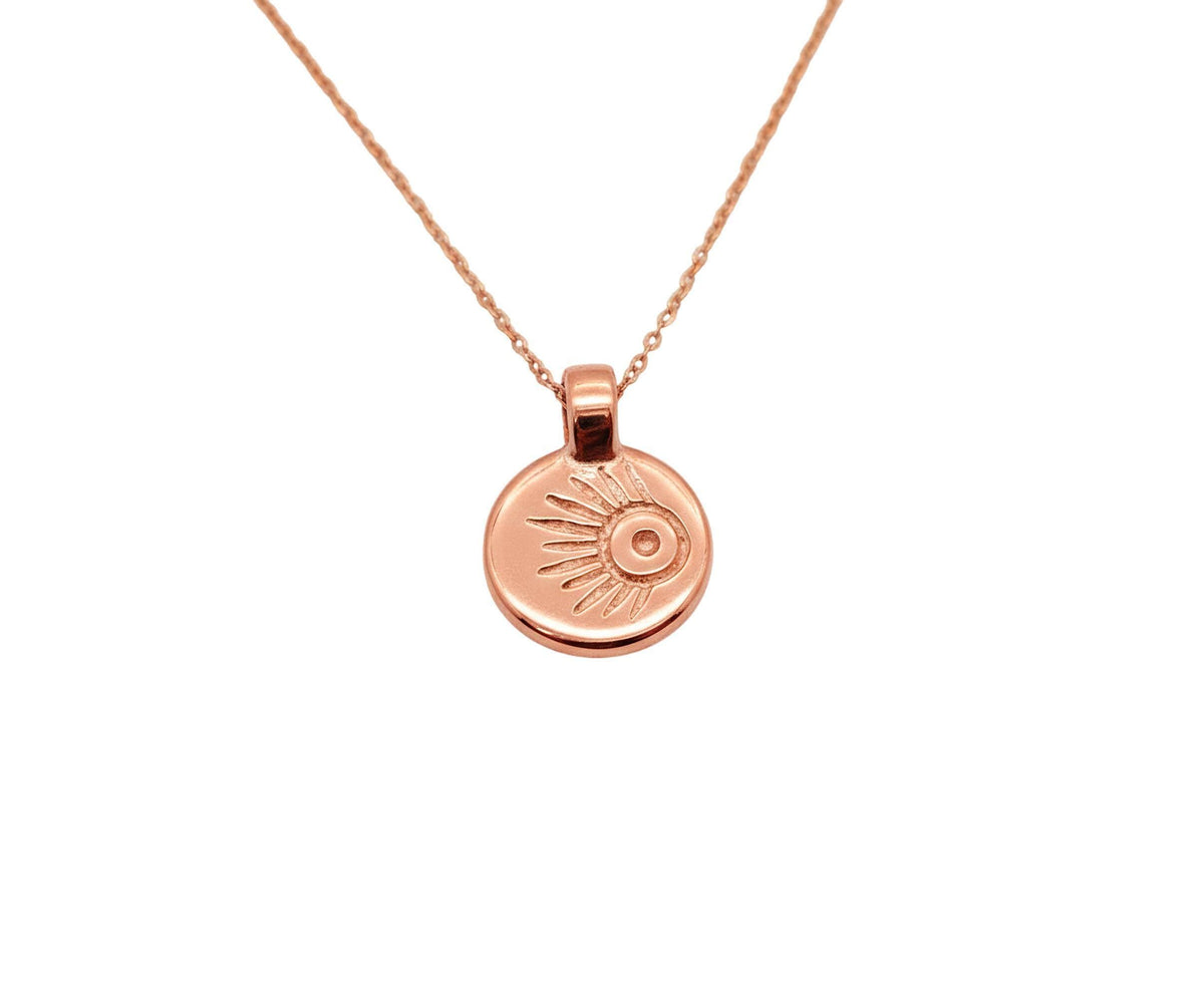 Meteor Wish Talisman Necklace | Gold Plated Celestial Coin Pendant | Shooting Star Sunburst Medallion, close-up detail