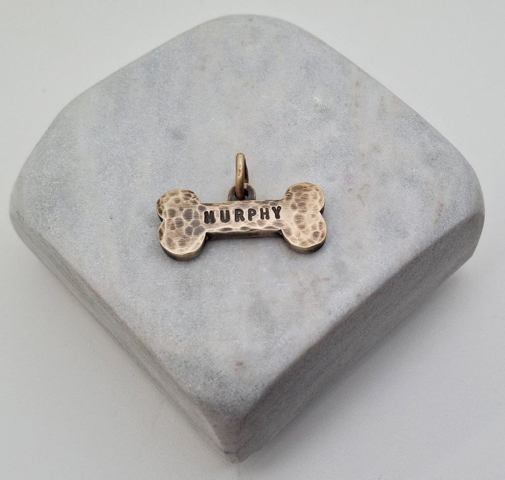 The Loyal Companion Token | Artisan Rustic Brass Bone Pet ID & Custom Tag, styled view