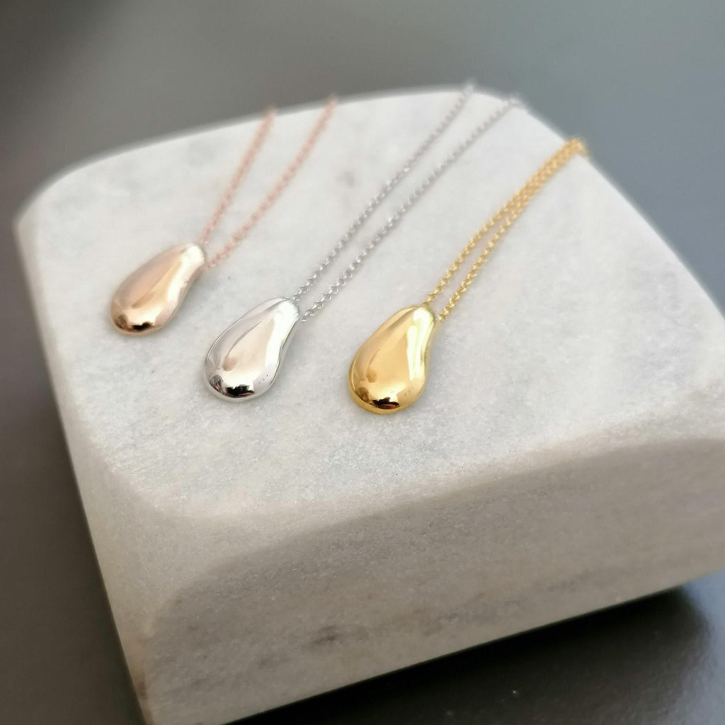 Solid Gold Pebble Necklace | Dainty Organic Fluid Charm | Minimalist River Stone Pendant, front view