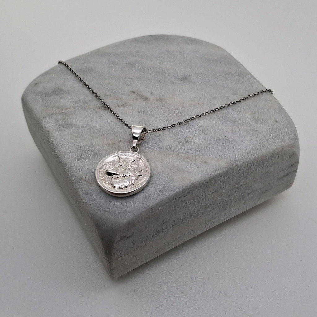 Nordic Wolf Charm Necklace | Sterling Silver Spirit Animal Medallion | Custom Engraved Wolf Pendant, close-up detail