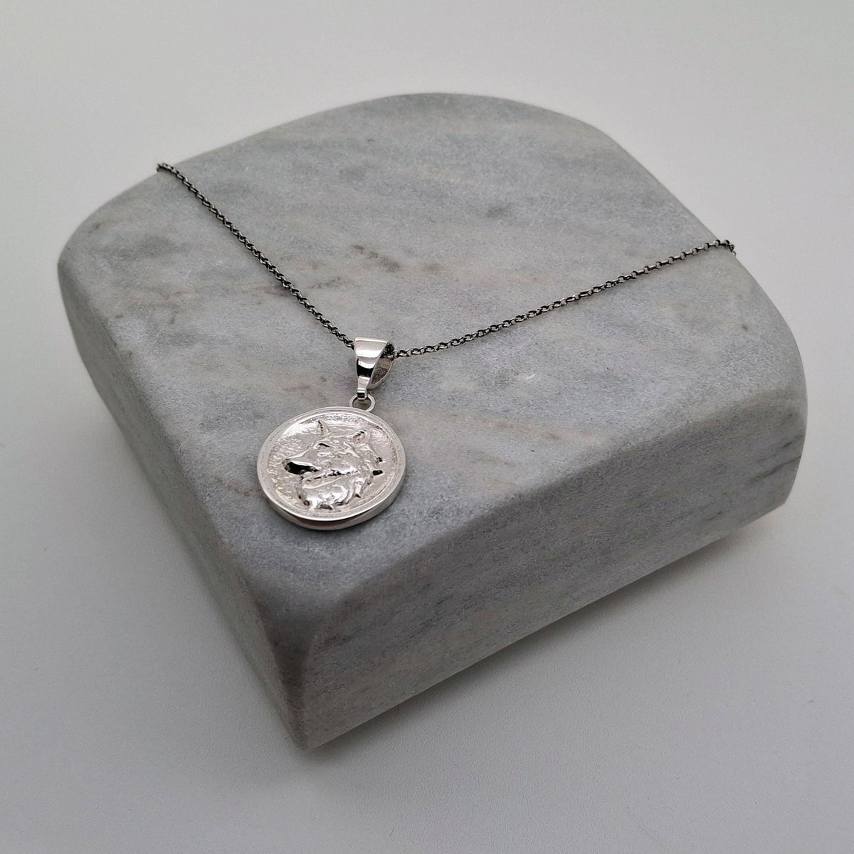 Nordic Wolf Charm Necklace | Sterling Silver Spirit Animal Medallion | Custom Engraved Wolf Pendant, close-up detail