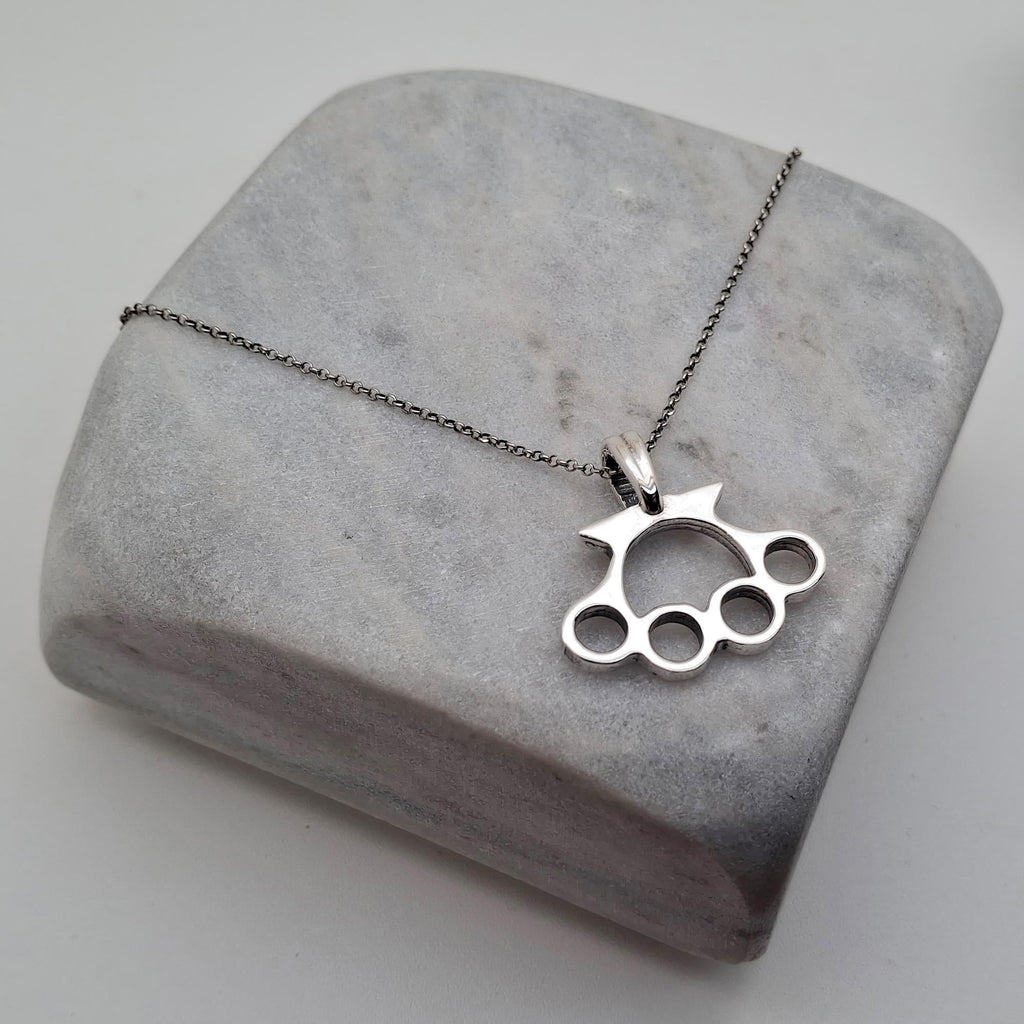 Knuckle Duster Necklace | Gold Plated Resilience Pendant, front view