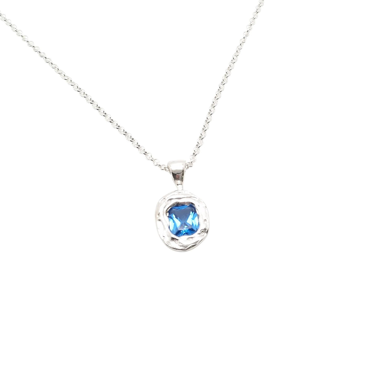 Ocean Wave Medallion | Deep Blue CZ Talisman, close-up detail