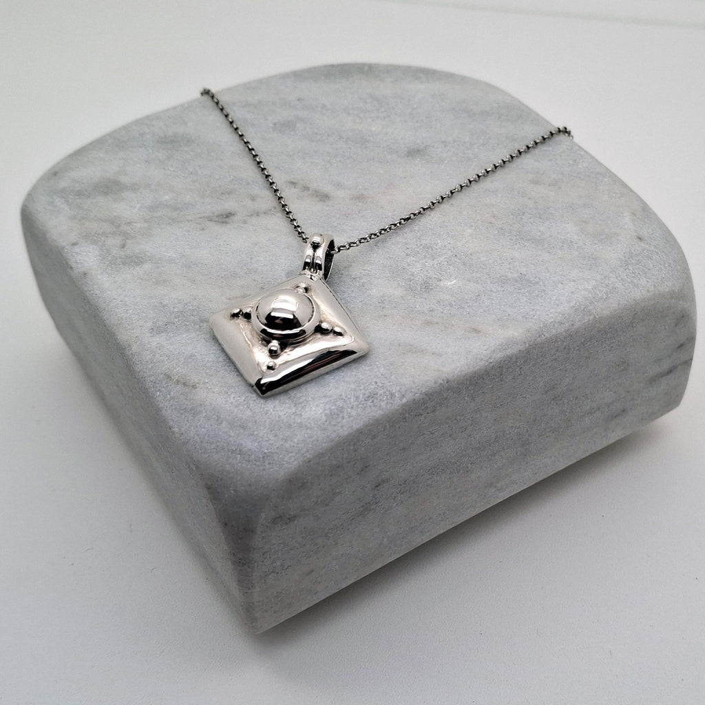 Armor Shield Necklace | Geometric Protection Pendant, front view