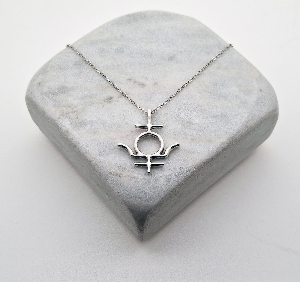 Pluto Symbol Necklace | Esoteric Rebirth Talisman, close-up detail