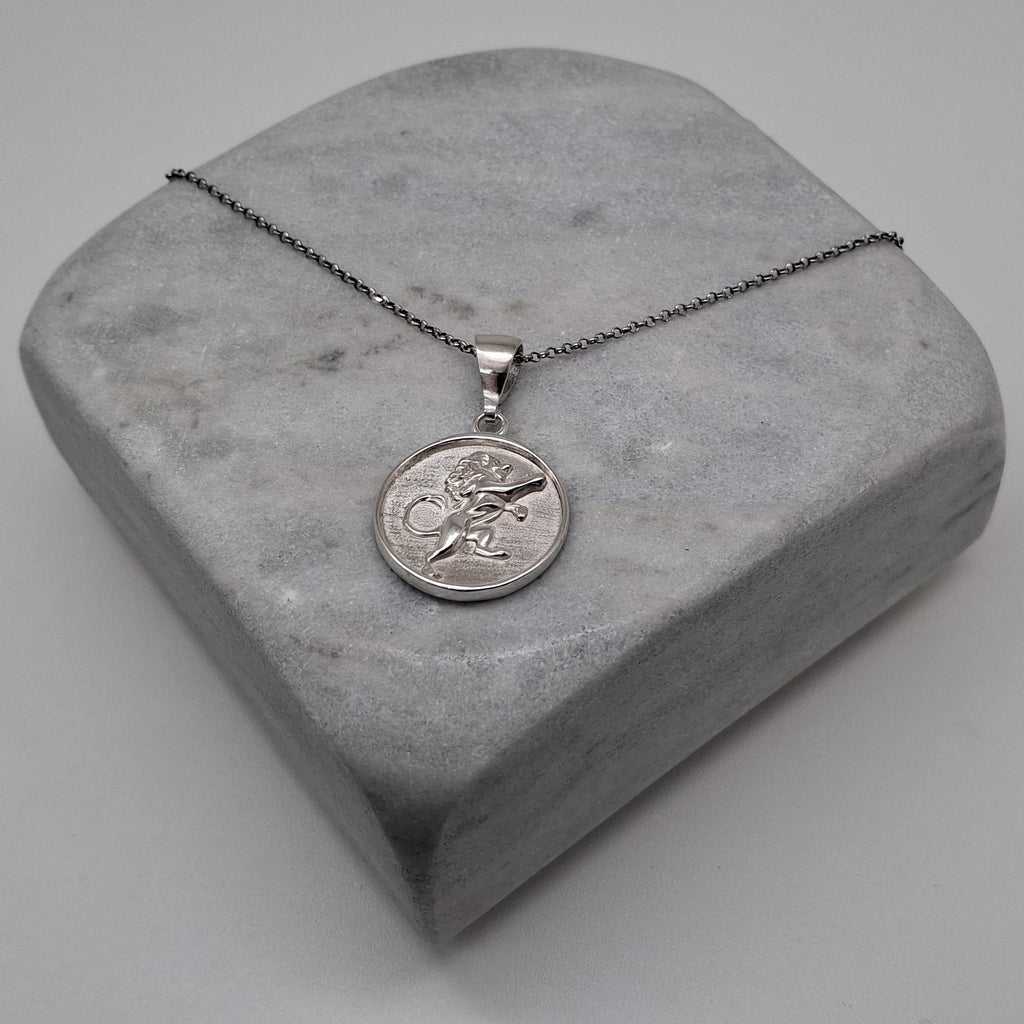 Lion Medallion Necklace | Rampant Emblem Talisman, close-up detail