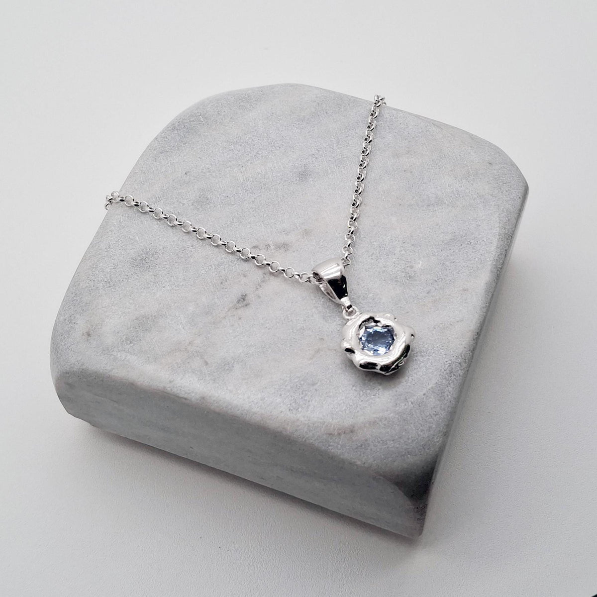 Celestial Pendant | Light Blue CZ Talisman, styled view