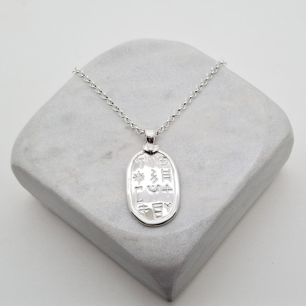 Symbolic Sterling Silver Pendant | Ancient Glyphs Medallion | Archaic Talisman, alternate angle