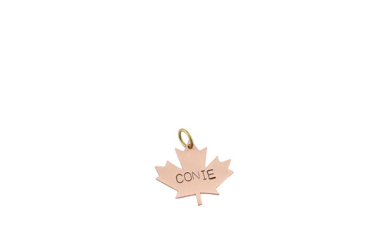 The True North Token | Artisan Maple Leaf Pet ID & Custom Tag, styled view