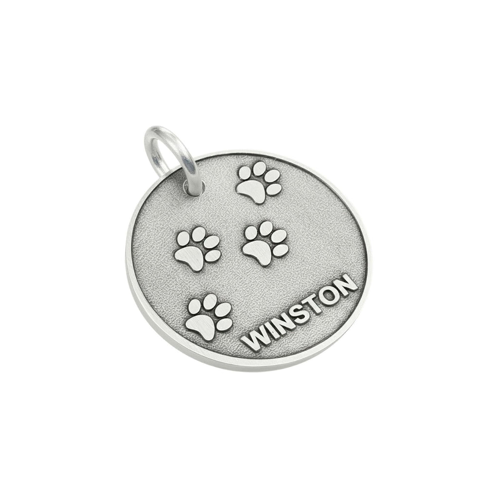 Paw Print Dog Tag | Custom Engraved Sterling Silver Pet ID | Heavy Duty Collar Charm, close-up detail