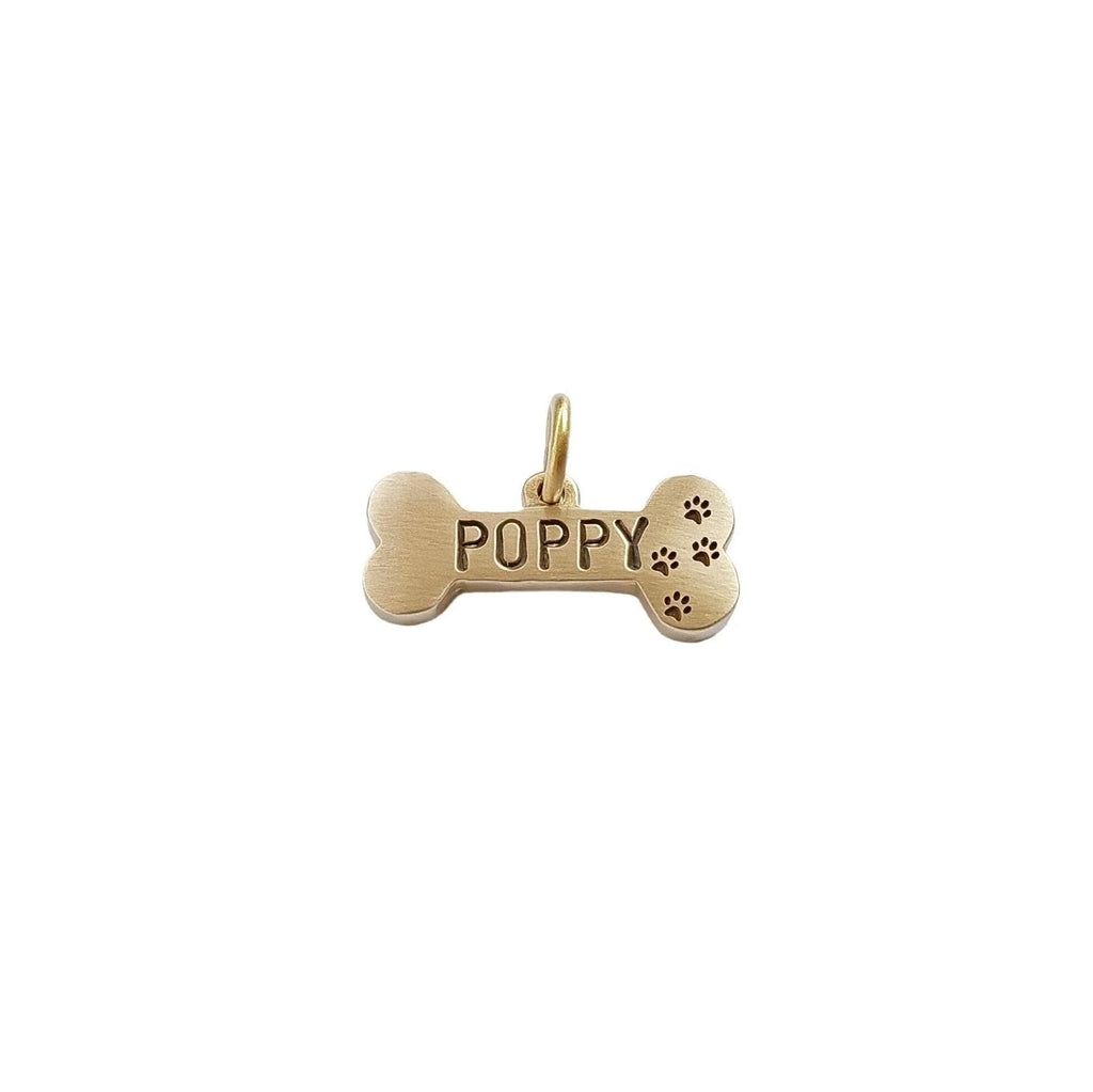 The Symbolic Bone Token | Heavy-Gauge Custom Motif Brass Pet ID Tag, with Four Paws motif