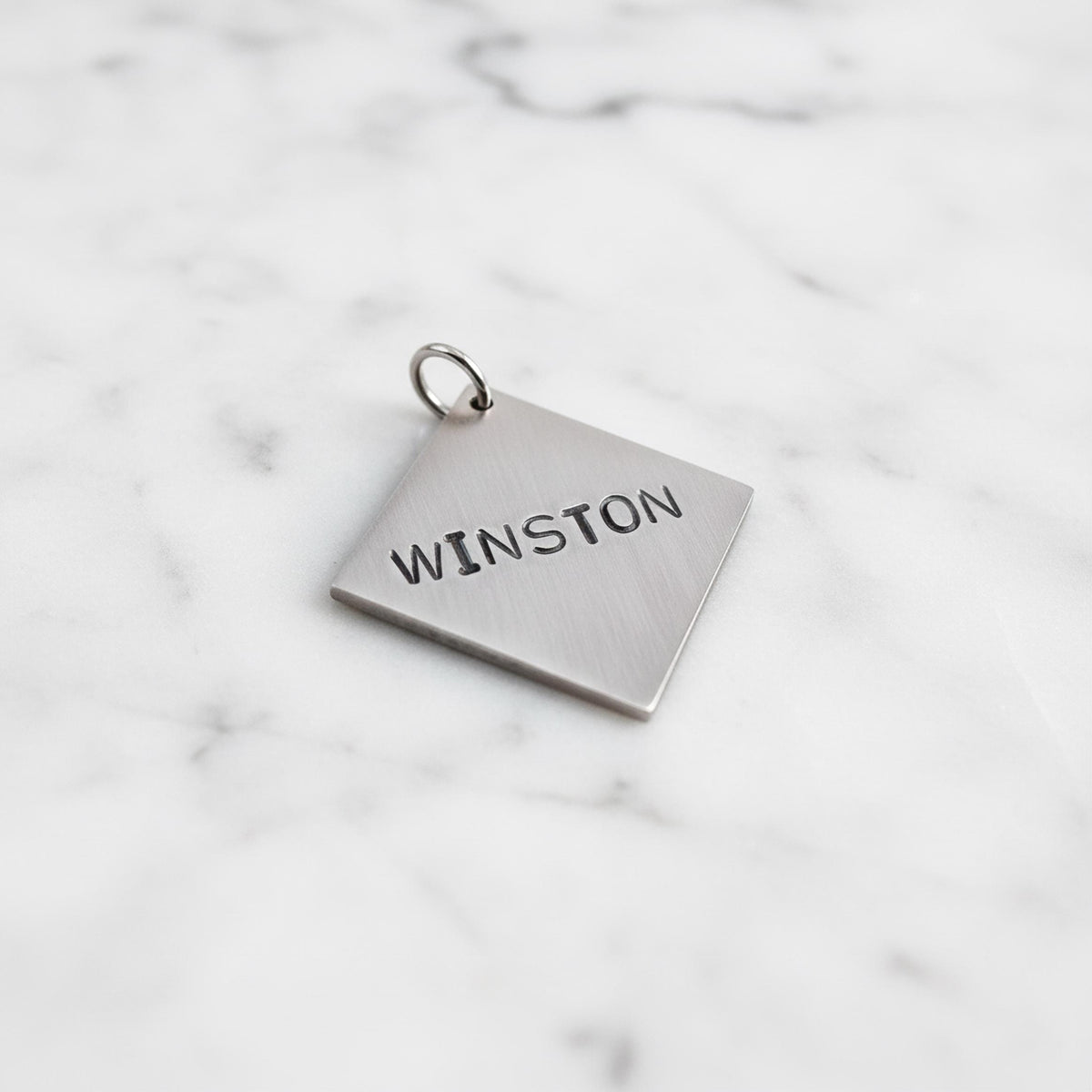 The Striking Rhombus Token | Artisan Geometric Pet ID & Custom Dog Tag, close-up detail