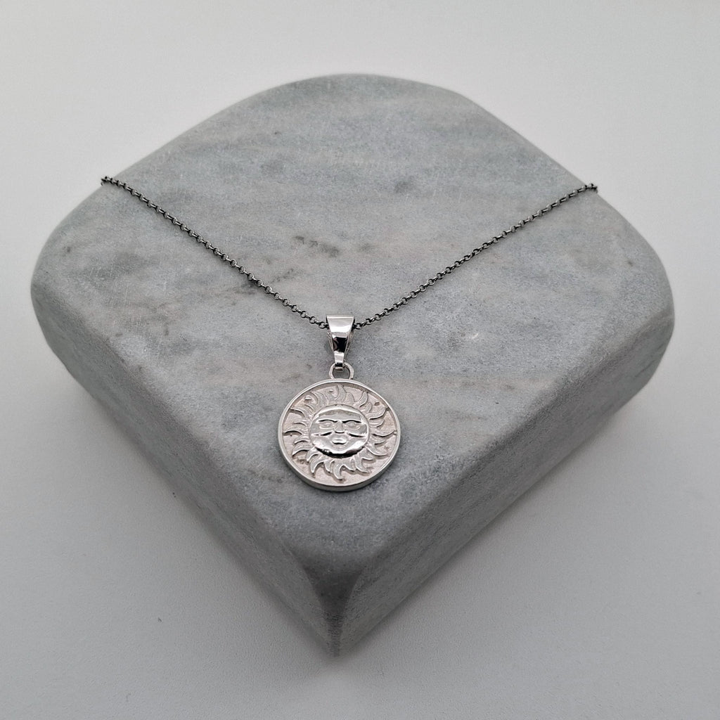 Celestial Smiling Sun Medallion | Radiant Optimism Talisman, close-up detail