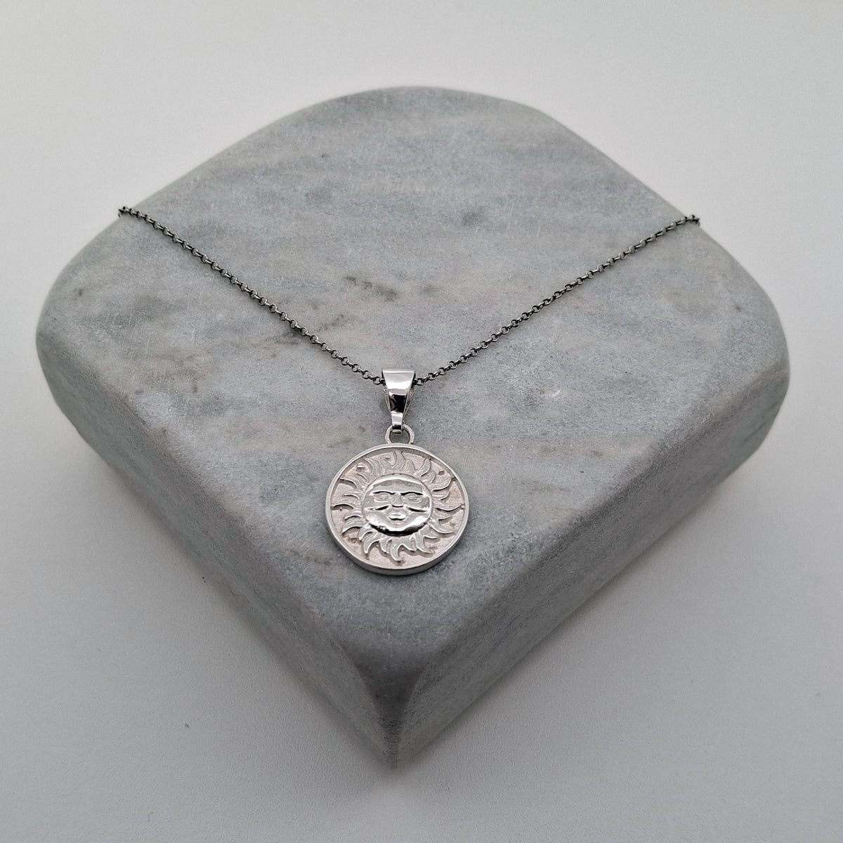 Celestial Smiling Sun Medallion | Radiant Optimism Talisman, close-up detail