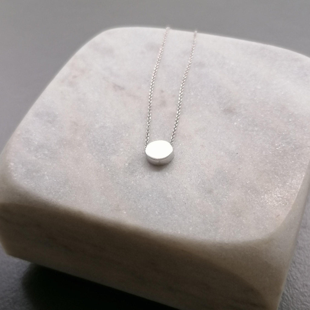 Dainty Karma Necklace | Simple Sterling Silver Circle Pendant | Minimalist Eternity Jewelry, close-up detail