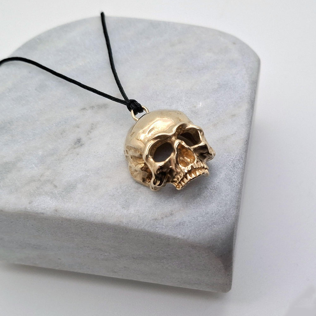 Brass Skull Necklace | 3D Gothic Memento Mori Pendant | Black Jade Cord Talisman, close-up detail