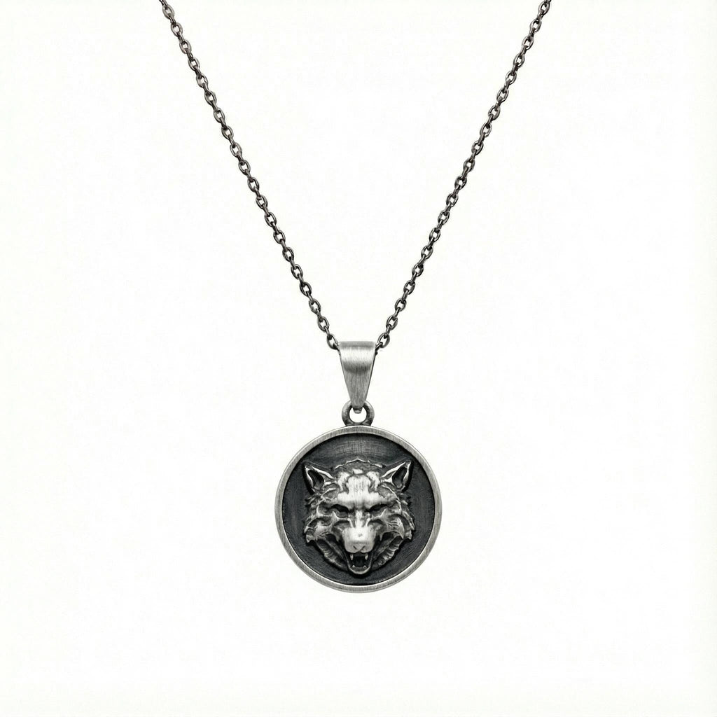Howling Wolf Medallion necklace chain and pendant detail, oxidized finish