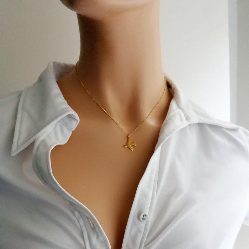 Airplane Necklace, additional angle of the pendant on a chain