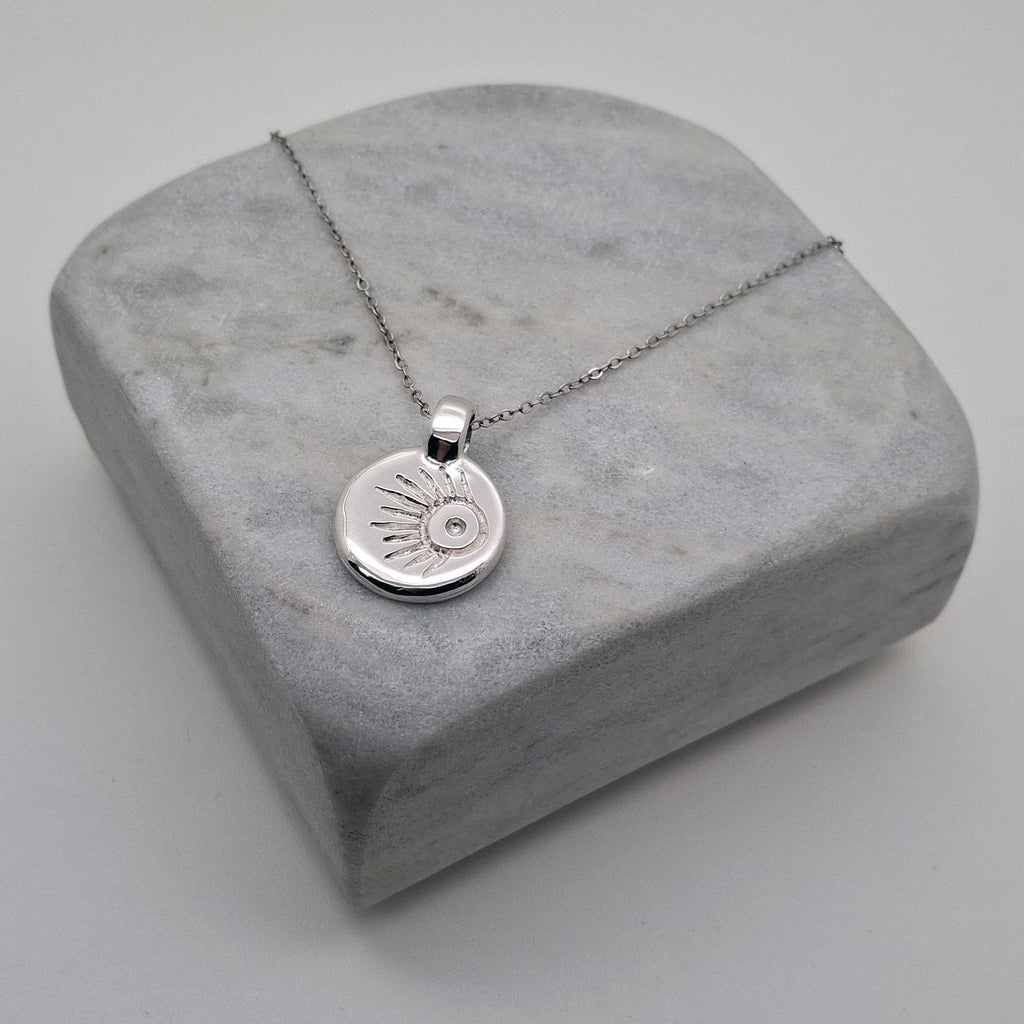 Meteor Wish Talisman Necklace | Gold Plated Celestial Coin Pendant | Shooting Star Sunburst Medallion, front view