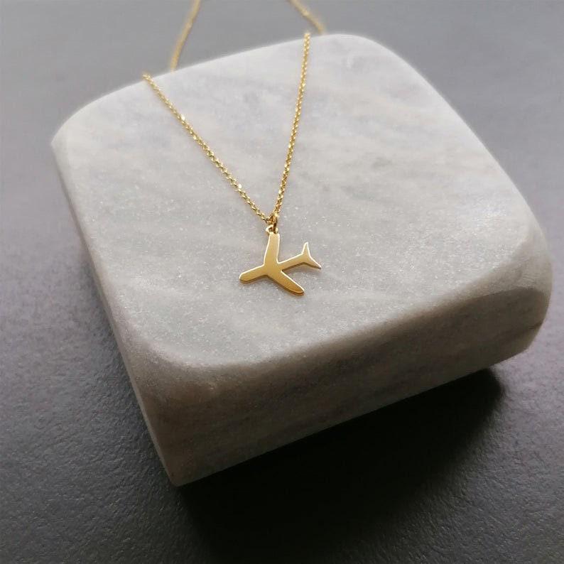 Airplane Necklace, additional detail view of the sterling silver charm