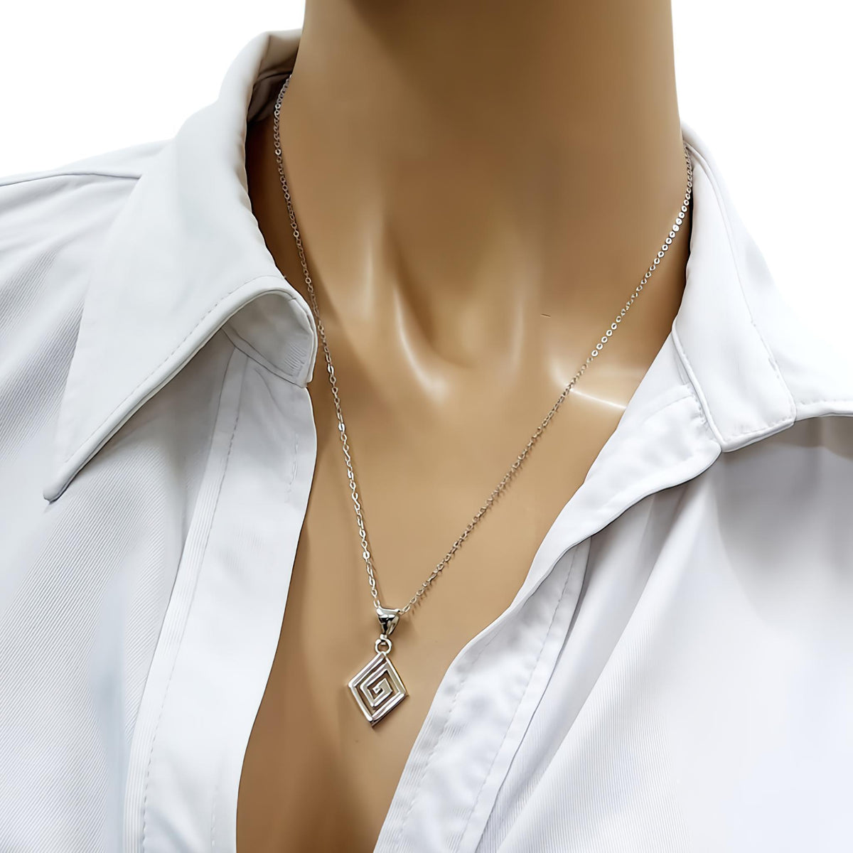 Greek Spiral Medallion | Rhombus Evolution Talisman, close-up detail