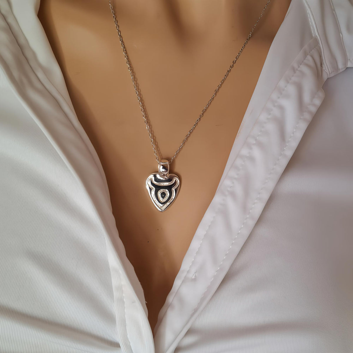Taurus Moon Necklace | Double-Sided Zodiac Pendant, styled view