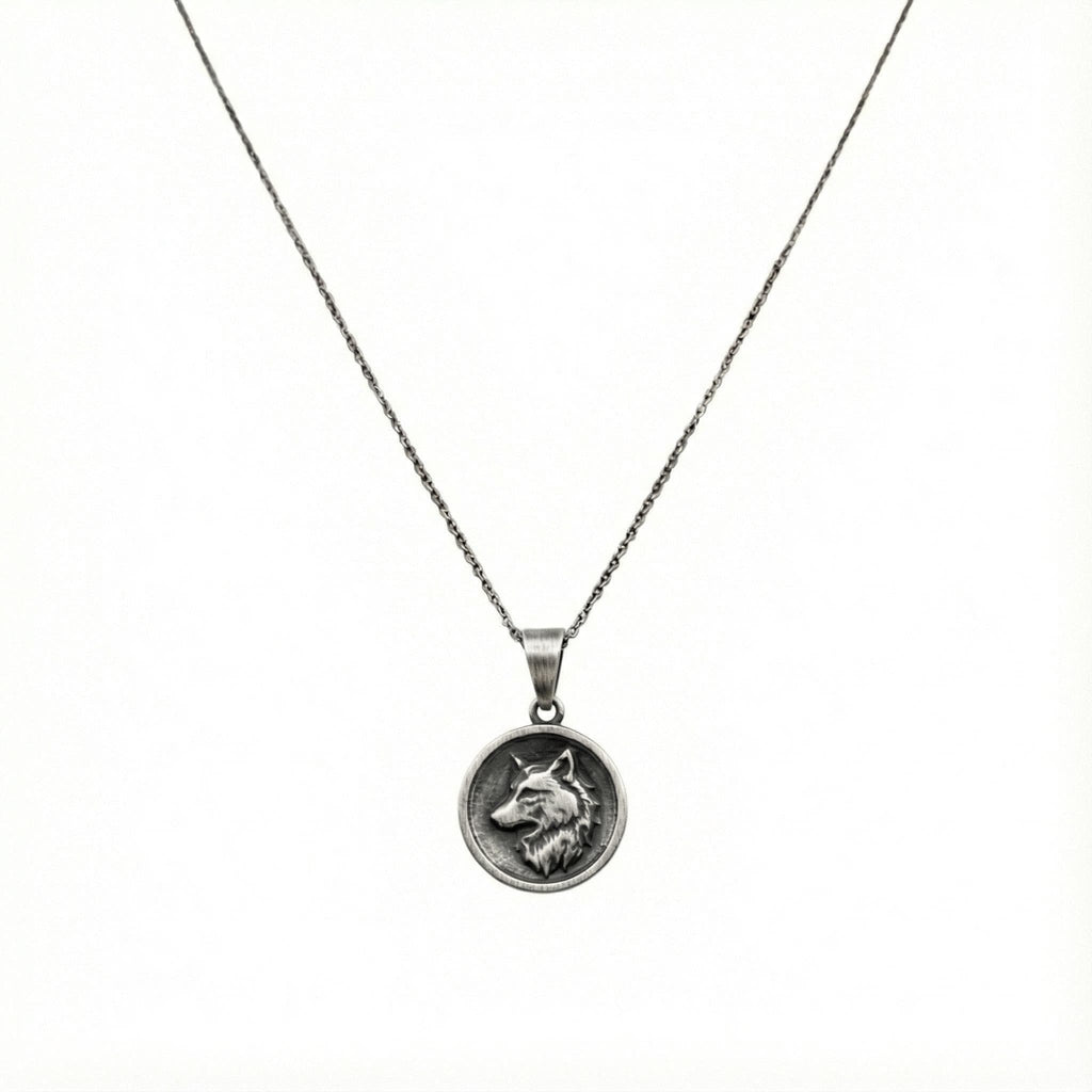 Nordic Wolf Charm Necklace flat lay, sterling silver chain and pendant