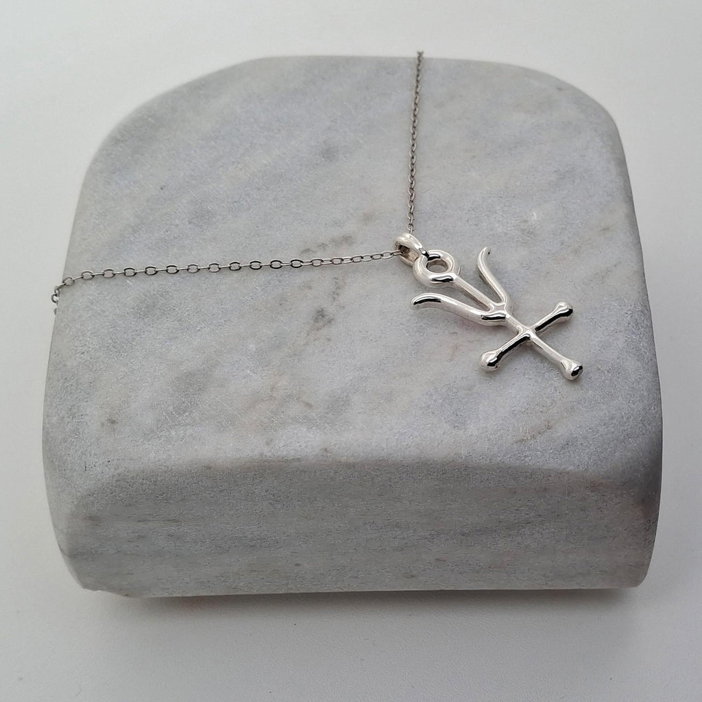 Antimony Alchemy Pendant | Wolf of Metals Talisman, close-up detail