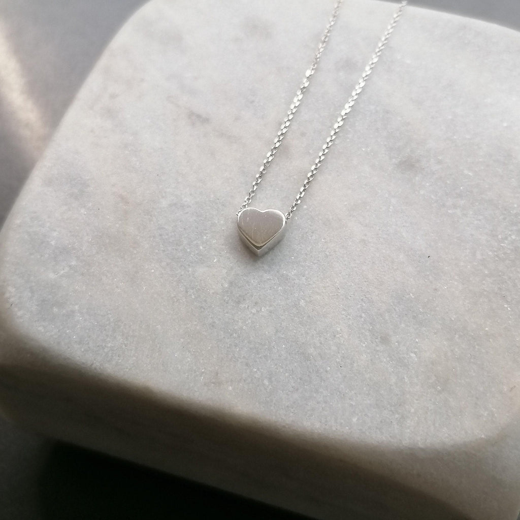 Silver Heart Necklace, Dainty Love Charm, Minimalist Pendant (925 Sterling), close-up detail