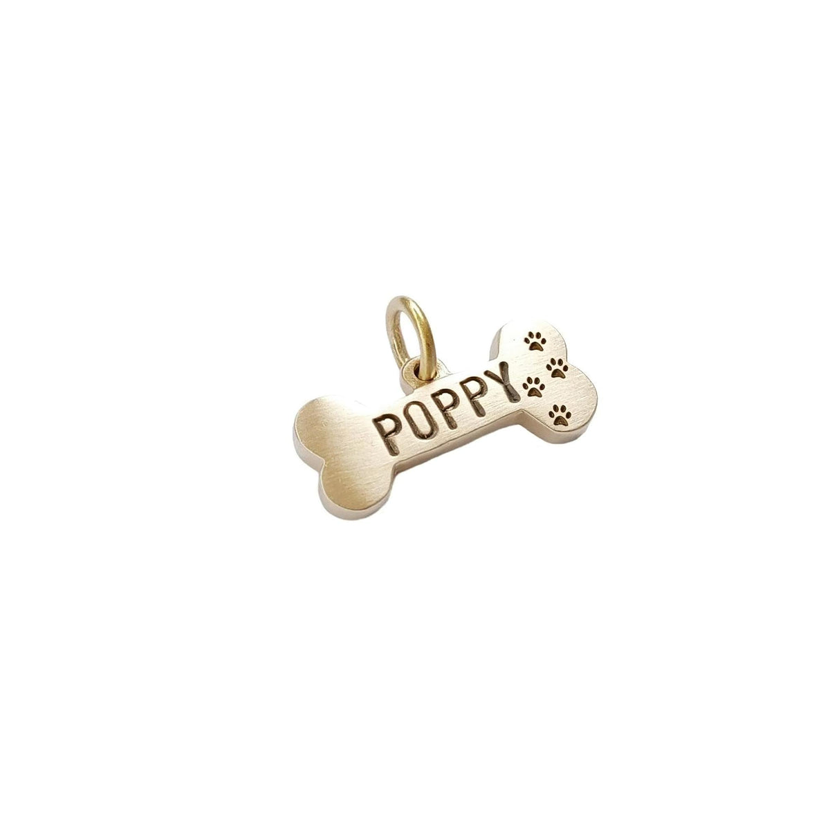 The Symbolic Bone Token | Heavy-Gauge Custom Motif Brass Pet ID Tag, front view