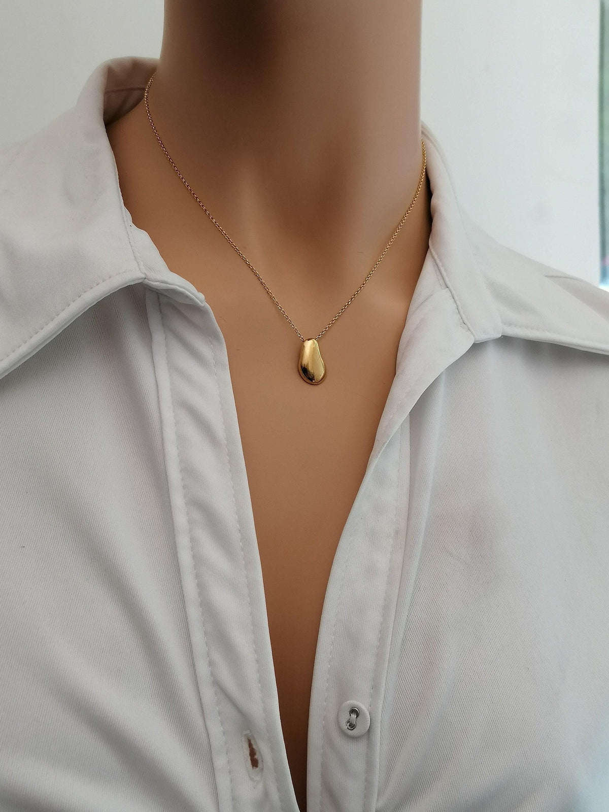 Solid Gold Pebble Necklace | Dainty Organic Fluid Charm | Minimalist River Stone Pendant, styled view