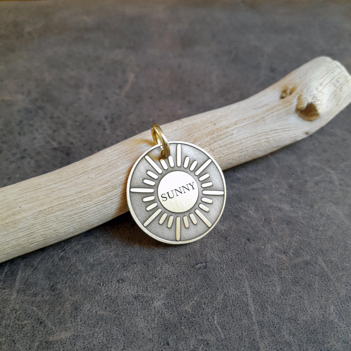 The Radiant Sun Token | Artisan Celestial Pet ID & Custom Engraved Sun Dog Tag, close-up detail