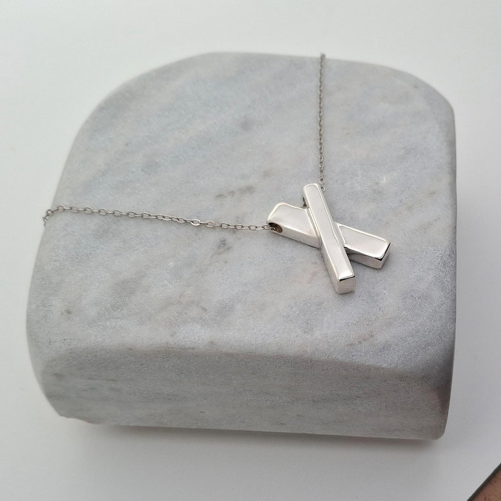 Minimalist Sterling Silver X Necklace | Dainty Kiss Cross Charm | Geometric Layering Pendant, alternate angle