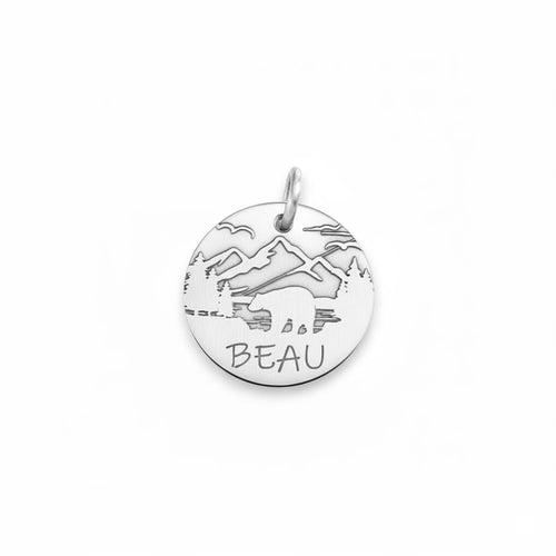 Adventure Bear Dog Tag, close up of the laser engraved bear and custom name