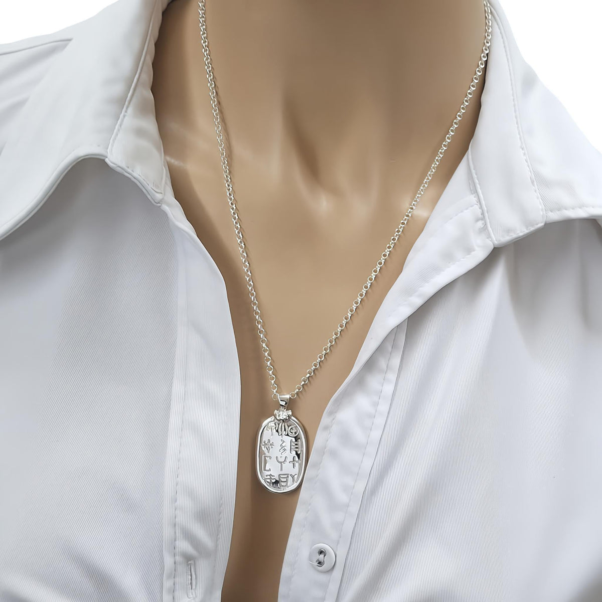 Symbolic Sterling Silver Pendant | Ancient Glyphs Medallion | Archaic Talisman, close-up detail