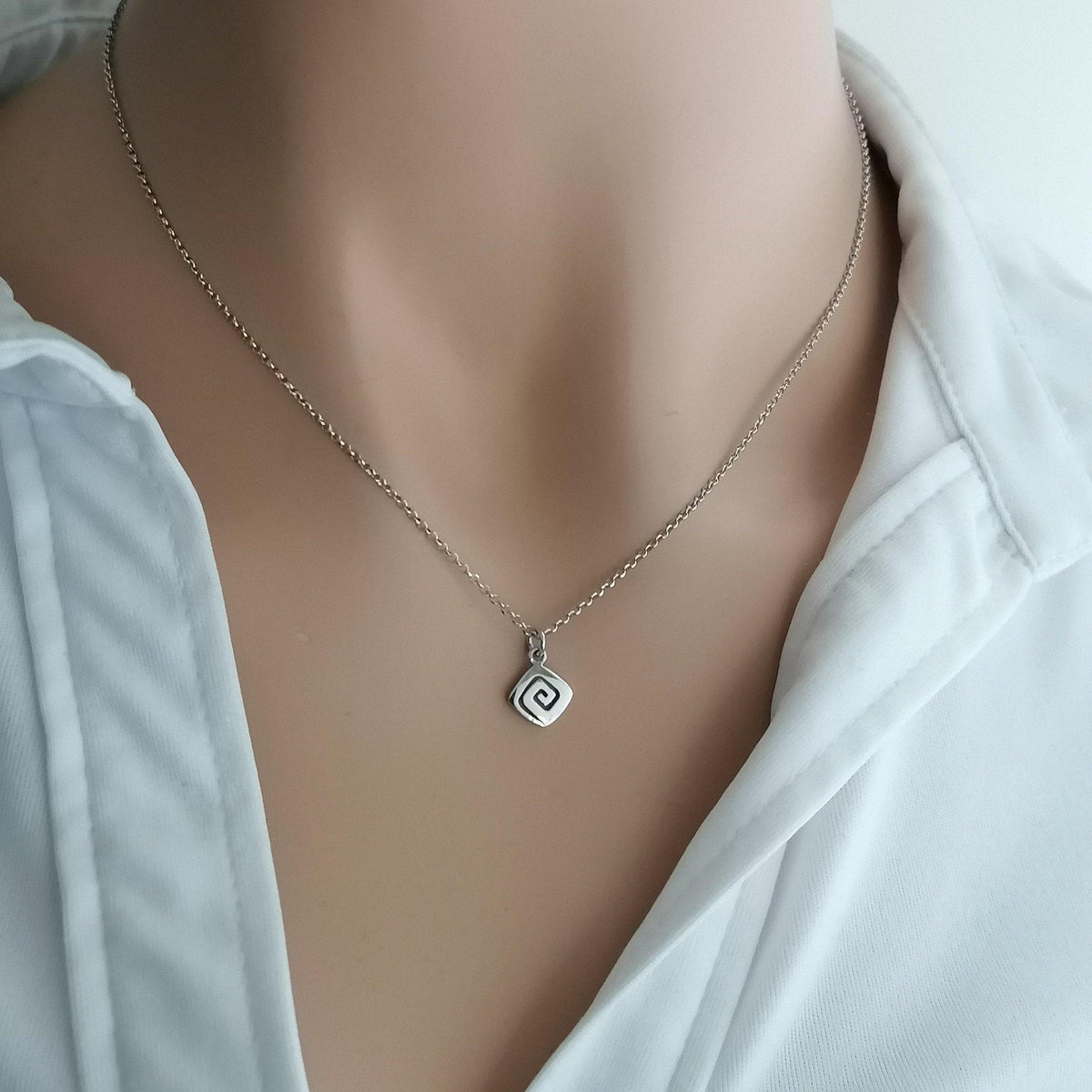 Spiral Necklace | Minimalist Small Sacred Geometry Pendant Sterling Silver | Cosmic Evolution Charm, front view