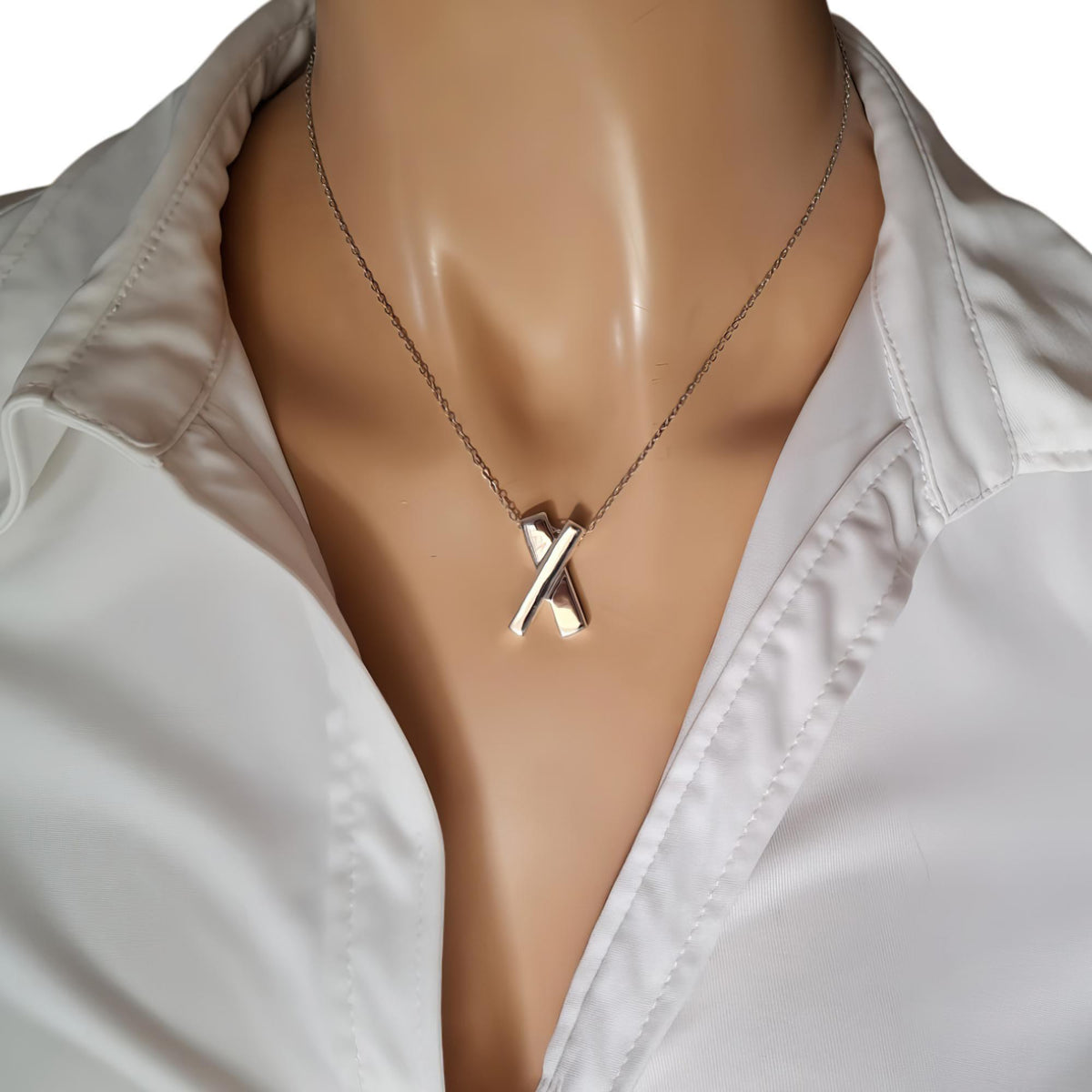Minimalist Sterling Silver X Necklace | Dainty Kiss Cross Charm | Geometric Layering Pendant, styled view
