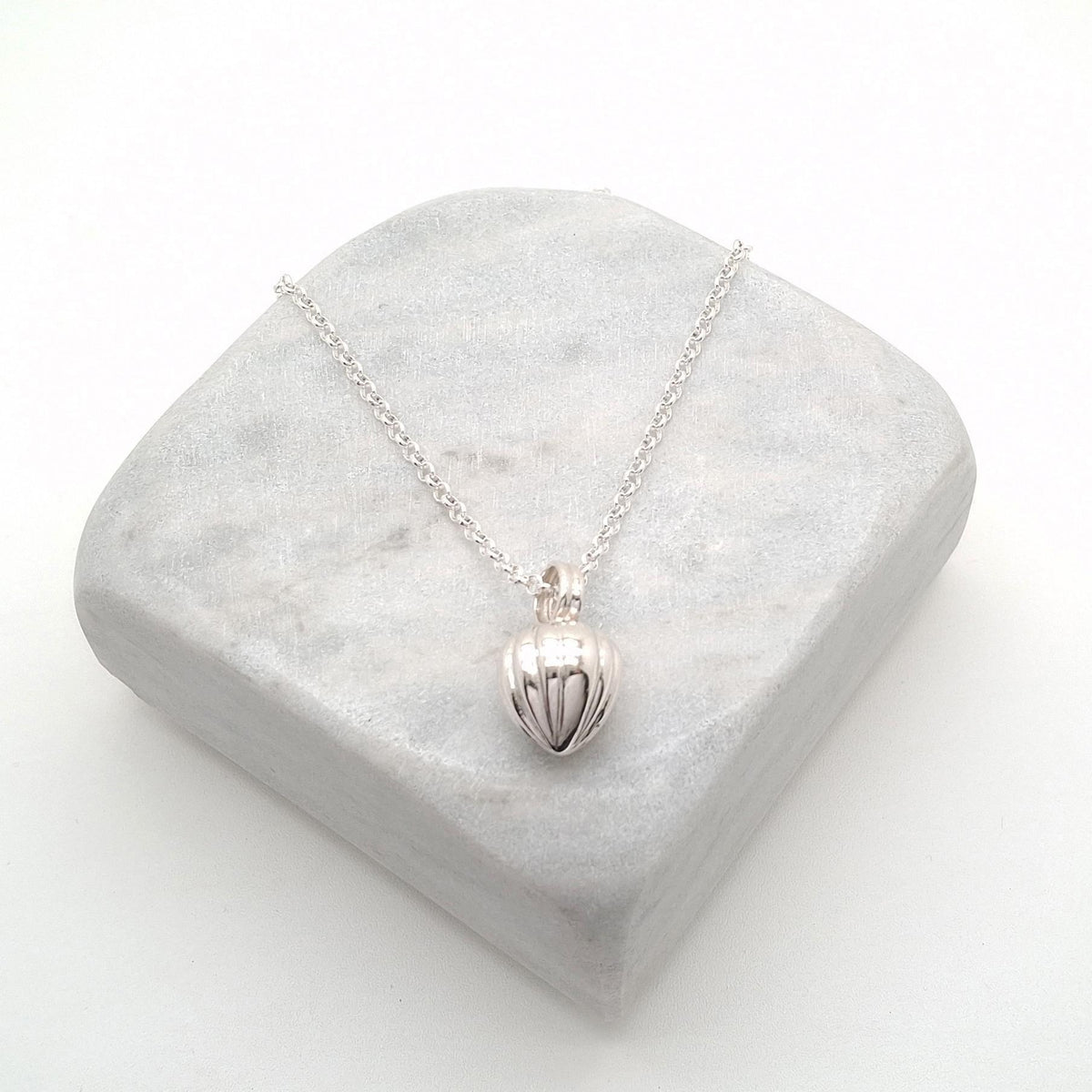 Acorn Pendulum Necklace in white gold plated finish