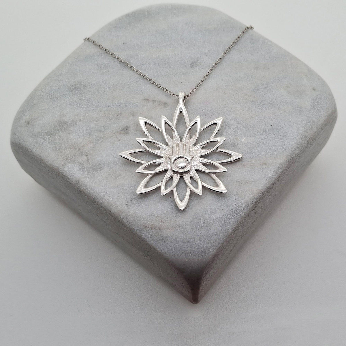 Blooming Hamsa Hand Necklace | Sterling Silver Lotus Protection Charm | Hand of Miriam Talisman, styled view