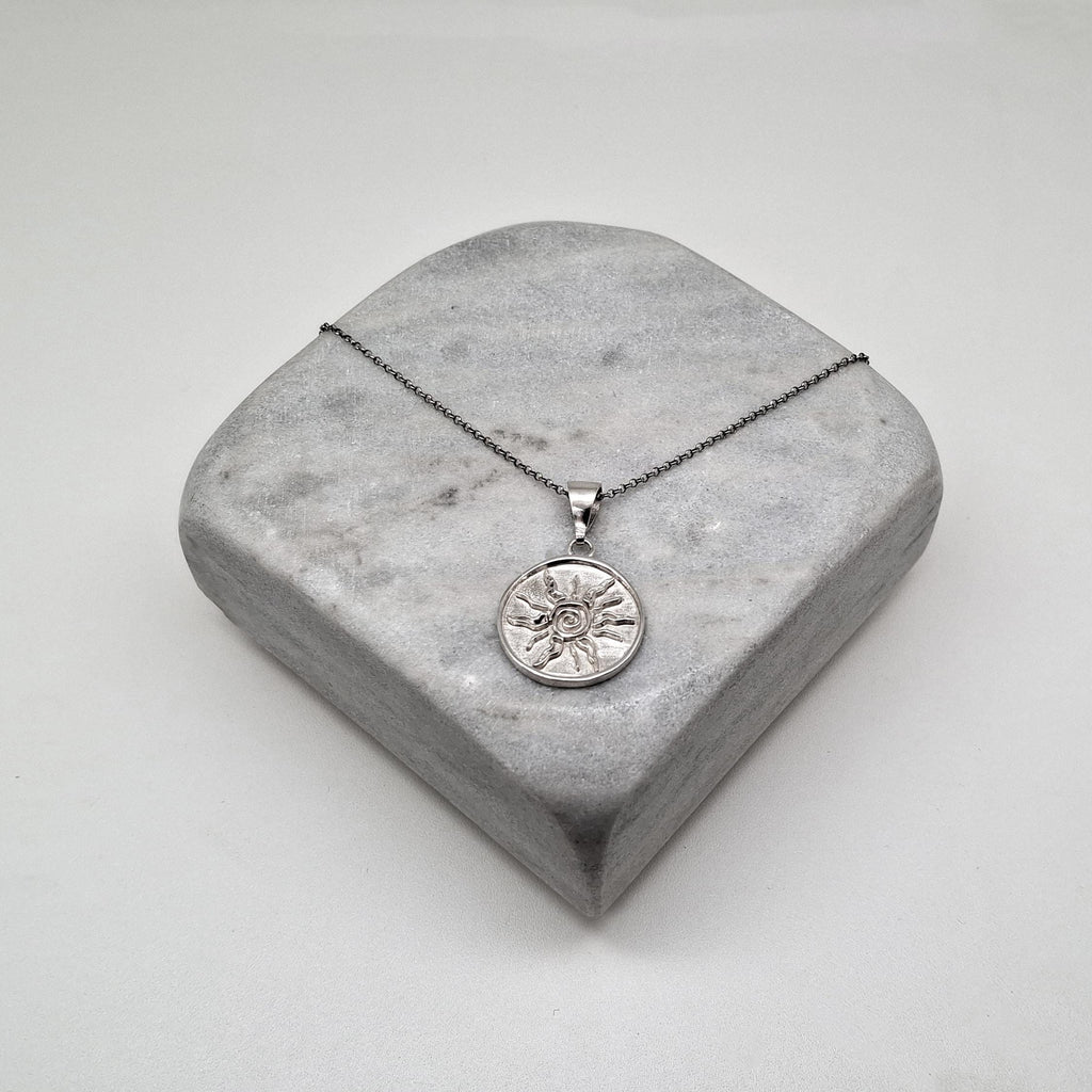 Sterling Silver Sun Necklace - Tribal Spiral Medallion Charm, styled view