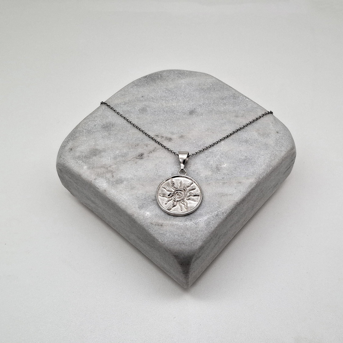 Sterling Silver Sun Necklace - Tribal Spiral Medallion Charm, styled view